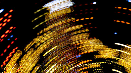 Blurred defocused lights in motion of christmas tree