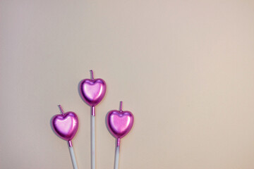 heart candle for cake. Valentine's day background top view.