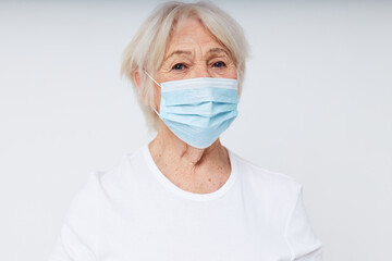 Photo of retired old lady medical mask protection safety close-up