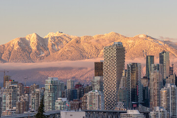 Downtown Vancouver with snowy mountain backdrop