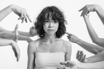 The impact of the environment on humans. A beautiful curly woman looks into the frame. Lots of...