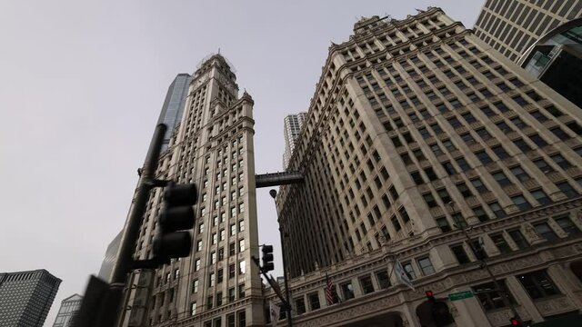 Low Angle View Driving By Wrigley Building In Chicago