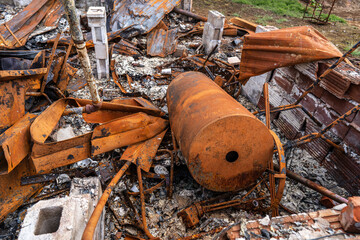 Burned down house after fire