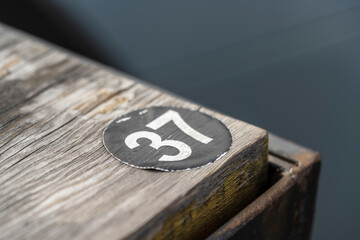 wooden table with numbers 37