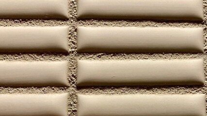 使いやすいシンプル素材壁紙　ベージュのタイルの壁