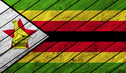 Zimbabwe flag on wooden background. 3D image