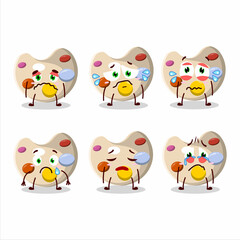 Paint palette cartoon character with sad expression