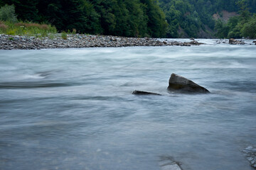 Obraz premium clean mountain river.
