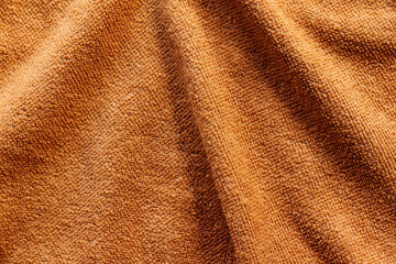 Elegant orange silk, luxurious fabric texture, elegant background design.