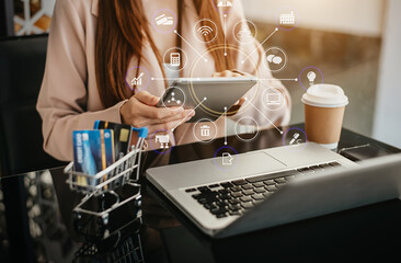 Woman using credit card and tablet.Businesswoman working at home. Online shopping, e-commerce, internet banking, spending money, working from home concept.