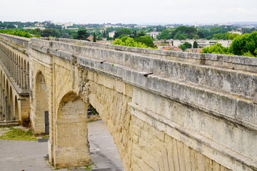 Aqueduct in Royale de Peyro Square Saint Clement building ancient arch in Montpellier