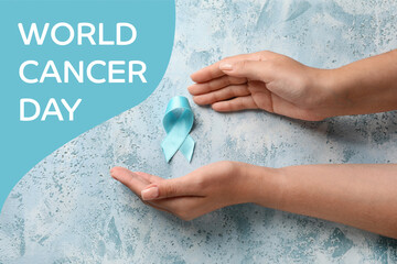 Female hands with light blue ribbon on color background. World Cancer Day