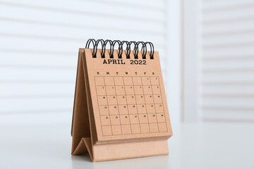 Craft calendar for April 2022 on table