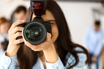 Female photographer during classes in studio