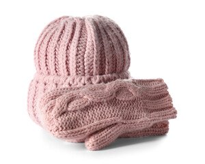 Knitted hat and mittens on white background