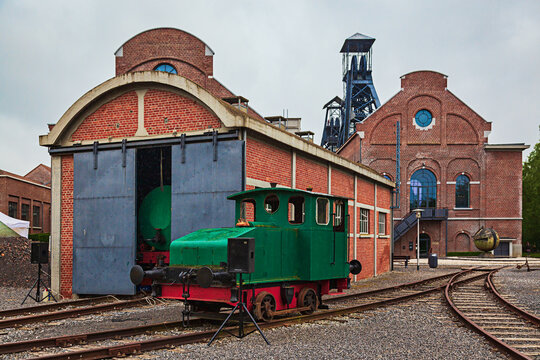 View of the Bois du Cazier site, with the distinctive headframes beyond the mine buildings, Marcinelle, near Charleroi, Belgium.