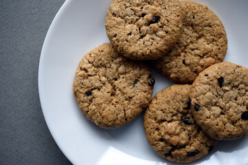 Oatmeal cookies with chocolate on a plate