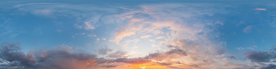 Dark blue sunset sky panorama with Cirrus clouds. Seamless hdr pano in spherical equirectangular format. Complete zenith for 3D visualization, game and sky replacement for aerial drone 360 panoramas.