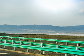 The boundless natural scenery of the Gobi Desert in Xinjiang, China, captured from a moving car