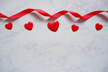Valentine concept Heart symbol composition on marble background. 