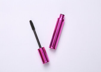 Eyelash brush with mascara on white background, beauty concept