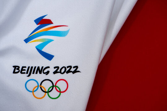 BEIJING, CHINA, JANUARY 1, 2022: Logo of winter olympic game 2022 in Beijing, Red edit space in background