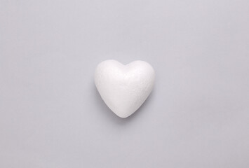 White volumetric heart on a gray background