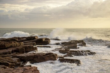 waves breaking on the rocks