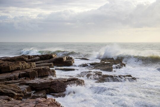 waves crashing on rocks