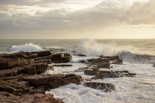 waves breaking on the rocks