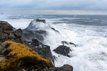 waves breaking on rocks Iceland