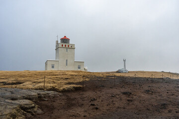 Fototapeta na wymiar lighthouse on the coast Iceland
