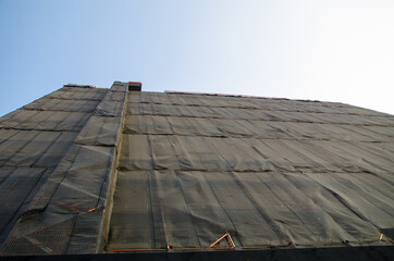 Facade Safety Construction site Protection Scaffold Covers in black.