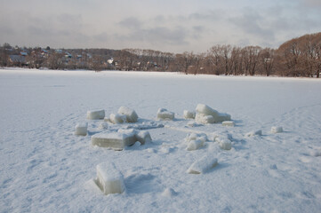 Ice blocks on frozen lake
