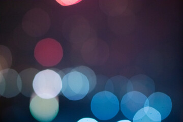 Abstract colorful defocused circular facula. Elegant background with bokeh lights and stars. Abstract circular Bokeh blurred color light can be uses as holidays background.