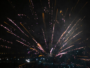 Fireworks. Sparkling fireworks in a nighttime sky. Useful for depicting  celebrations.
