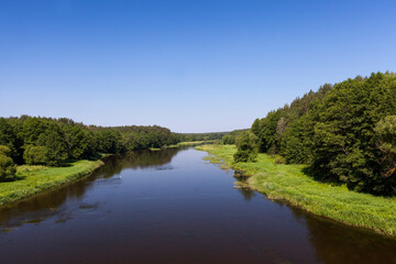 a summer landscape with river