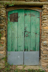 Old wooden green country door