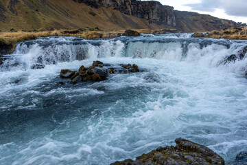 waterfall in the mountains, Iceland
