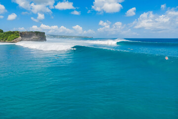 Fototapeta na wymiar Aerial view of big blue waves for surfing. Perfect ocean waves
