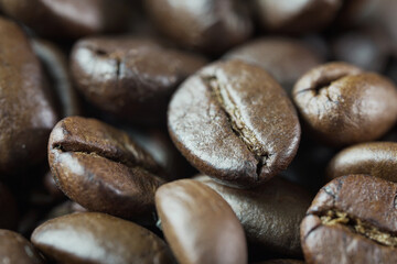 Roasted coffee beans background. Top view. Copy space 