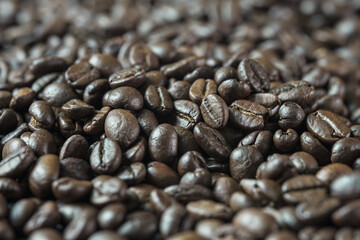 Roasted coffee beans background. Top view. Copy space 