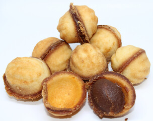 a bunch of fried cookies with condensed milk for a delicious sweet dessert for the holiday