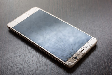 Smartphone mobile with a broken screen. 
