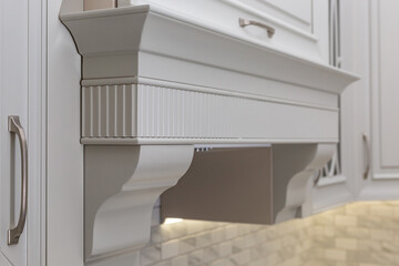 Cornice in a modern kitchen. An element of kitchen furniture. Selective focusing.