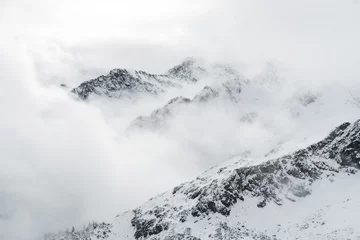 Schnee in den Alpen Bergen Winter mit Bäumen und Felsen  © Dominic Wunderlich