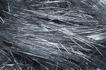 stylish metallic silver tinsel threads also called lametta background
