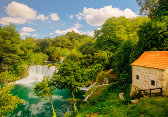 Fototapeta na wymiar Waterfalls Krka, National Park, Dalmatia, Croatia. Traveling concept background.