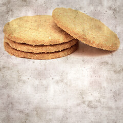 square stylish old textured paper background with round baked oatcakes