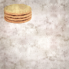 square stylish old textured paper background with round baked oatcakes